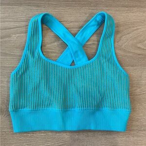 JoyLab brand ribbed seamless sports bra, likely in a blue